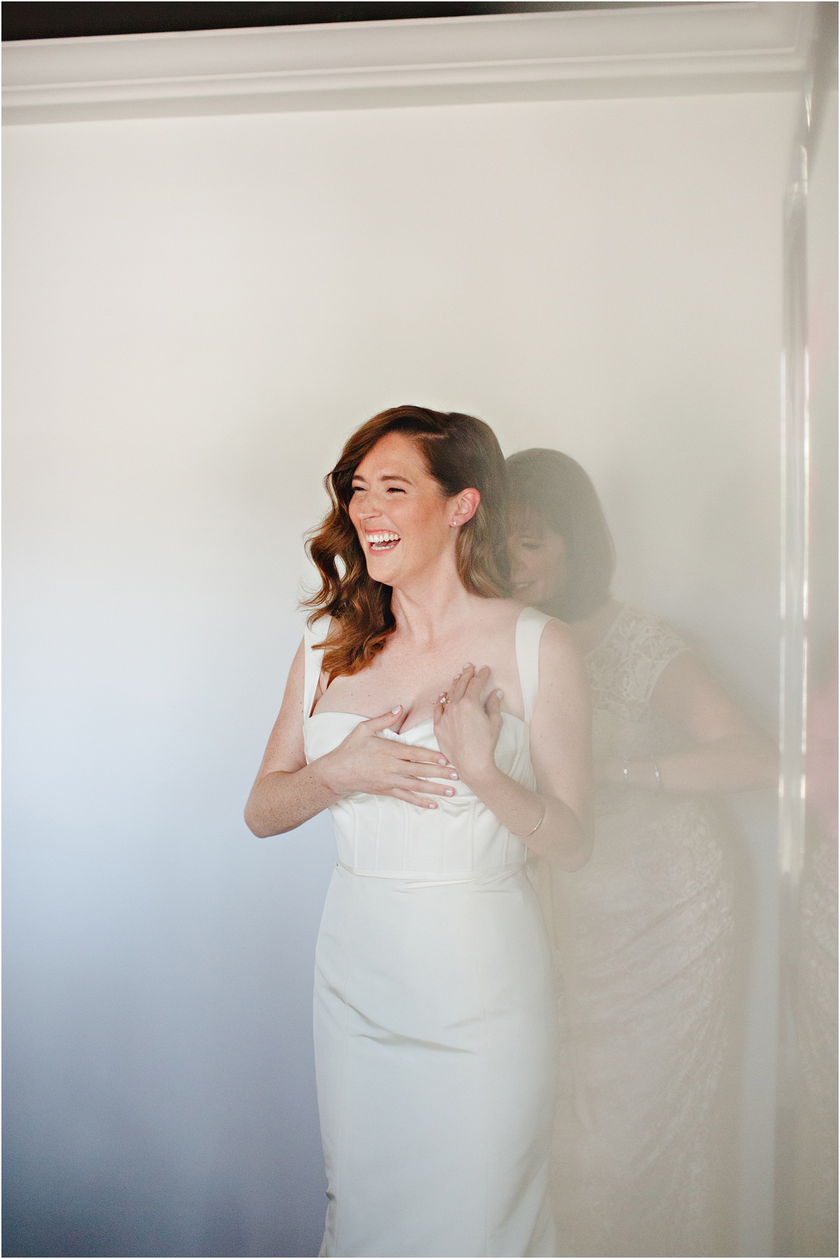 Mom Helping Bride Get Dressed | Stacee Lianna Photography